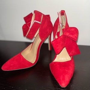 Red suede pointed toe high heels